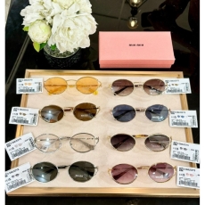 Miu miu Sunglasses